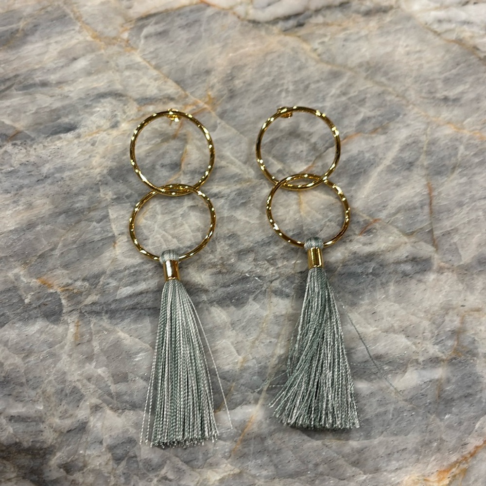 Gold hoop with blue tassel statement earrings